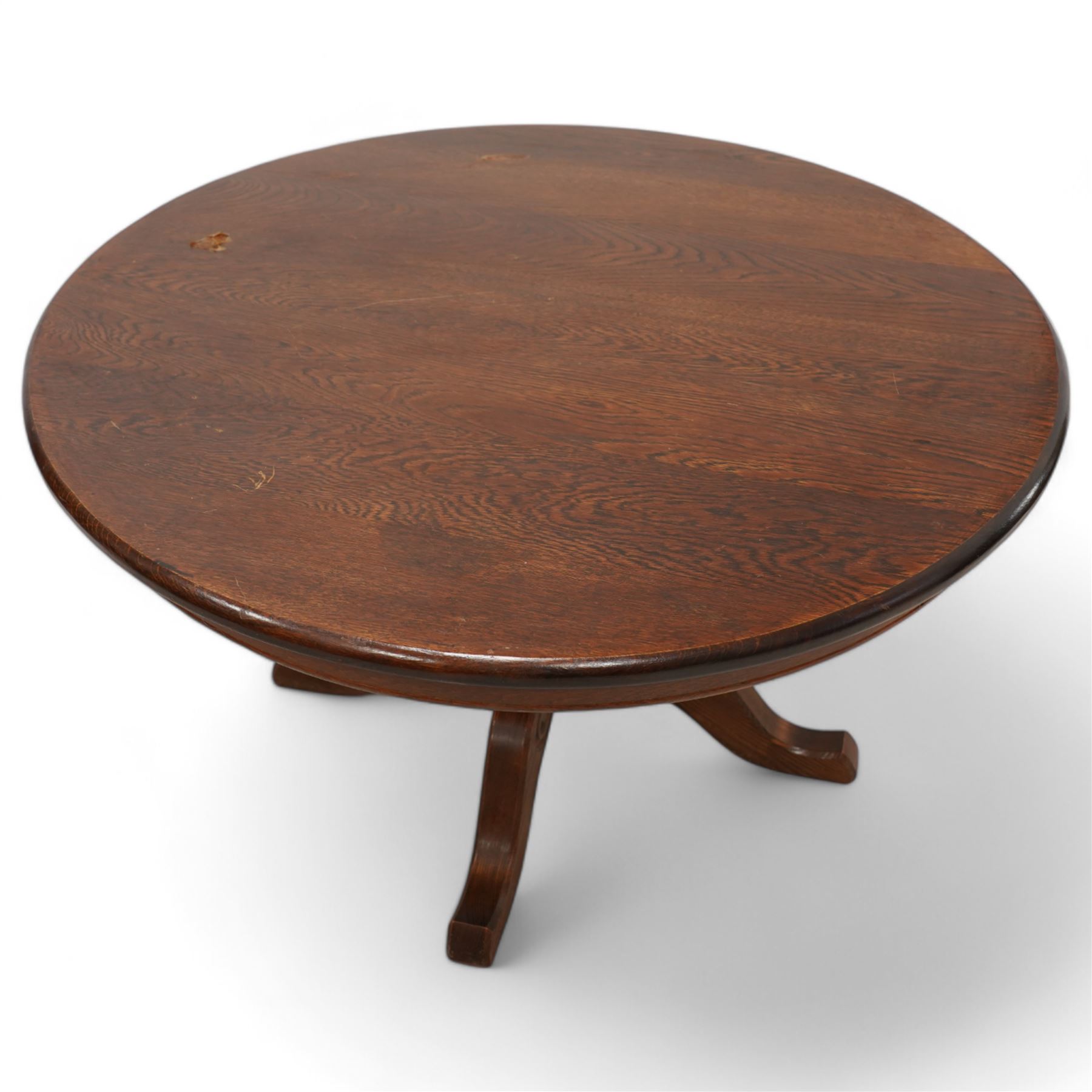 Early-to-mid 20th century oak coffee table, circular top over baluster pedestal, terminating in three splayed supports