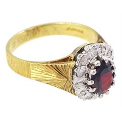 18ct gold oval cut garnet and diamond cluster ring, London 1975