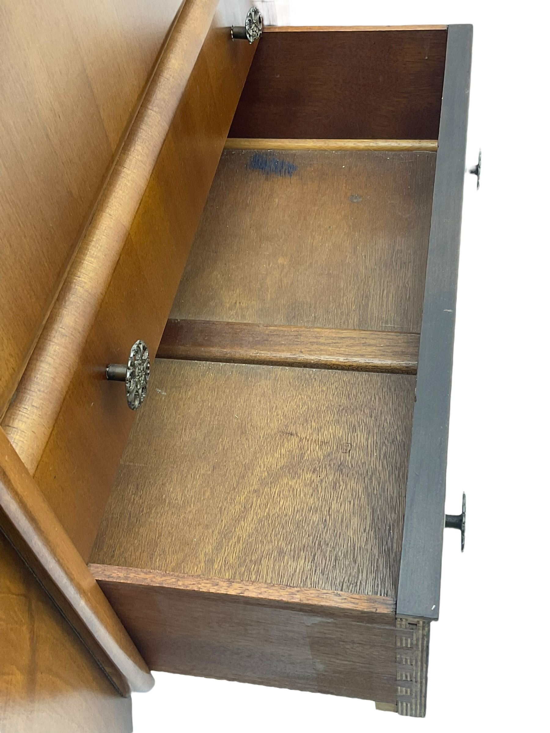 Beautility - mid-20th century walnut sideboard, fall-front with sliding top enclosing mirror interior, fitted with two drawers and flanking cupboards, on sledge feet with curved stretchers 