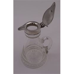 1930s silver mounted glass whiskey tot, with C handle and star cut base, the silver collar and cover with thumbpiece, hallmarked S Blanckensee & Son Ltd, Birmingham 1932, including thumbpiece H10.5cm