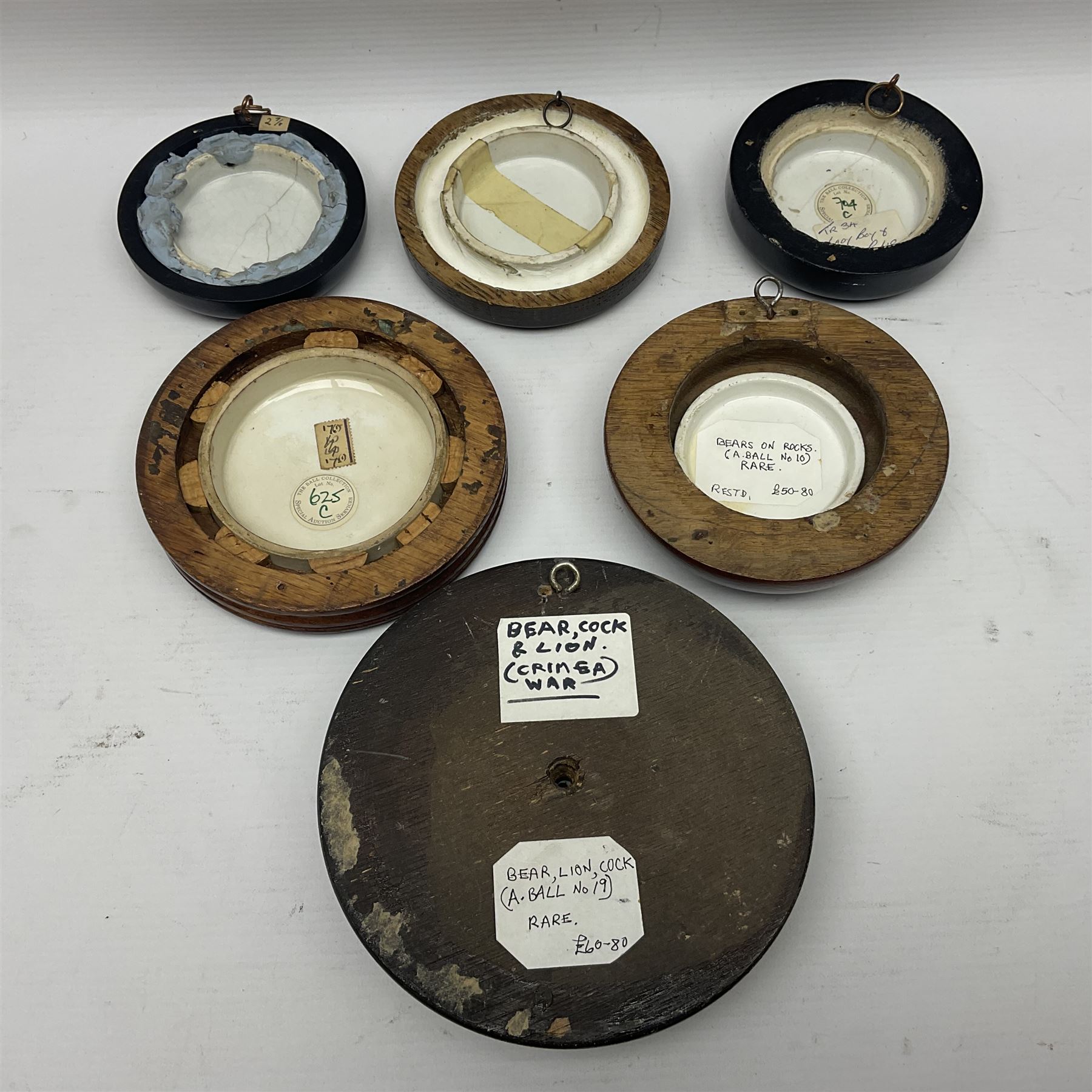 Six framed Prattware pot lids comprising 'Bear, Cock & Lion', 'Bear on Rock', 'Alas! Poor Bruin', ' Lady, Boy and Goats', 'The Shrimpers' and one other, largest D15.5cm (6)