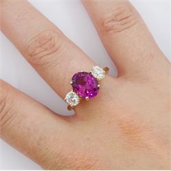 18ct gold three stone oval cut pink sapphire and round brilliant cut diamond ring, hallmarked, sapphire approx 3.00 carat, total diamond weight approx 0.80 carat