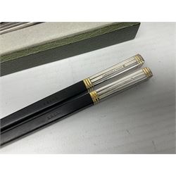 Set of eight silver plated ebony chopsticks by Christofle France, in presentation case