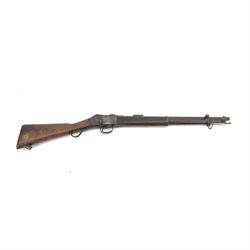 Martini-Henry MKII/2 Carbine, the 52cm round barrel with various inspectors marks,   fitted with ladder sight, with various inspector's marks, the action marked Enfield, the walnut full stock with two steel barrel bands, the butt inset with brass roundel stamped' 12 1893 V 1 GR. A 6', and with Sold Out of Service arrows to the butt, action and barrel, steel cleaning rod beneath, overall 96cm
Sold as an exempt item under Section 58 (2) of the 1968 Firearms Act, to be held as a curiosity or ornament


