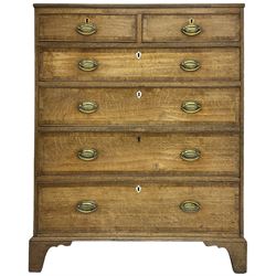 George III oak and mahogany banded chest, rectangular reed moulded top, fitted with two short and four long graduating cock-beaded drawers, mahogany banded drawer fronts with shied shaped escutcheons, on bracket feet 