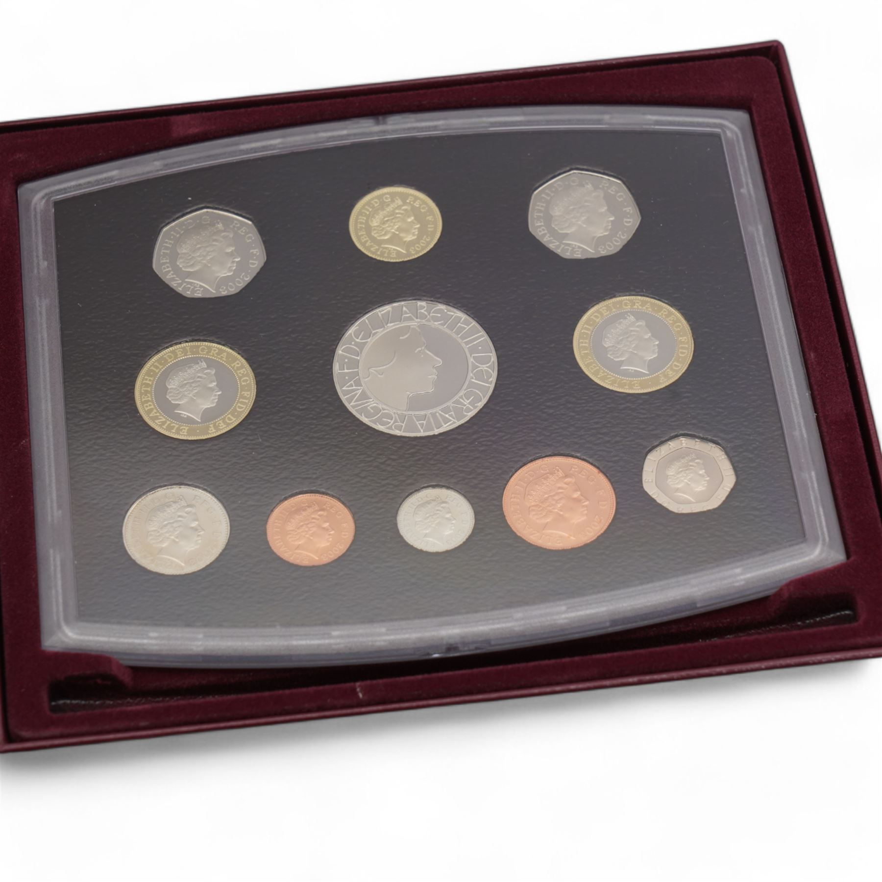 Eleven The Royal Mint United Kingdom proof coin collections, dated 1985, 1986, 1987, 1988, 1990, 1992 with dual dated fifty pence, 1994, 1996, 1999, 2001 and 2003, all cased with certificates