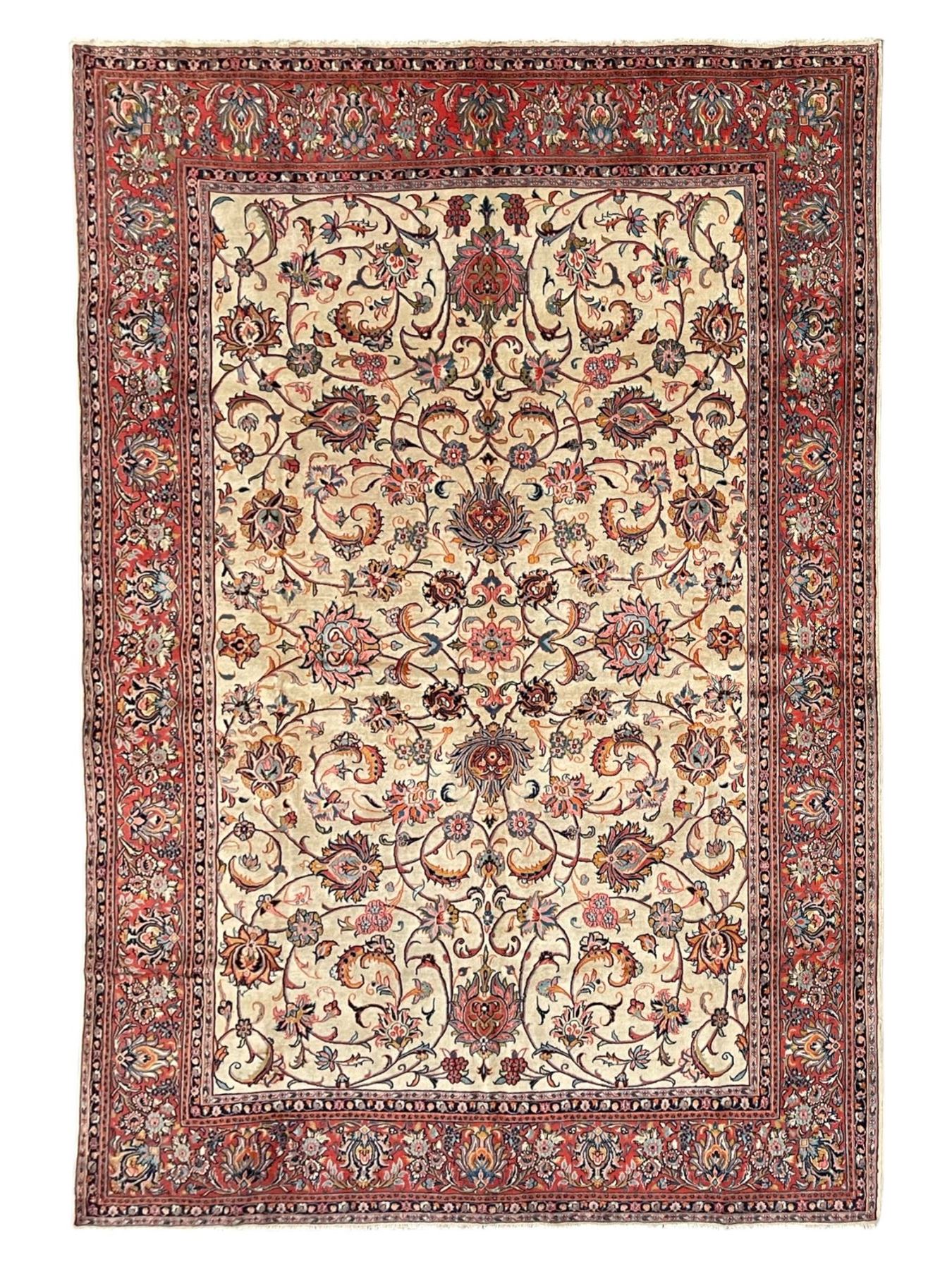 Persian Sarough ivory ground rug, the field decorated with curled leafy branches and palmettes, crimson ground border decorated with further palmettes and floral sprays, within guard stripes 