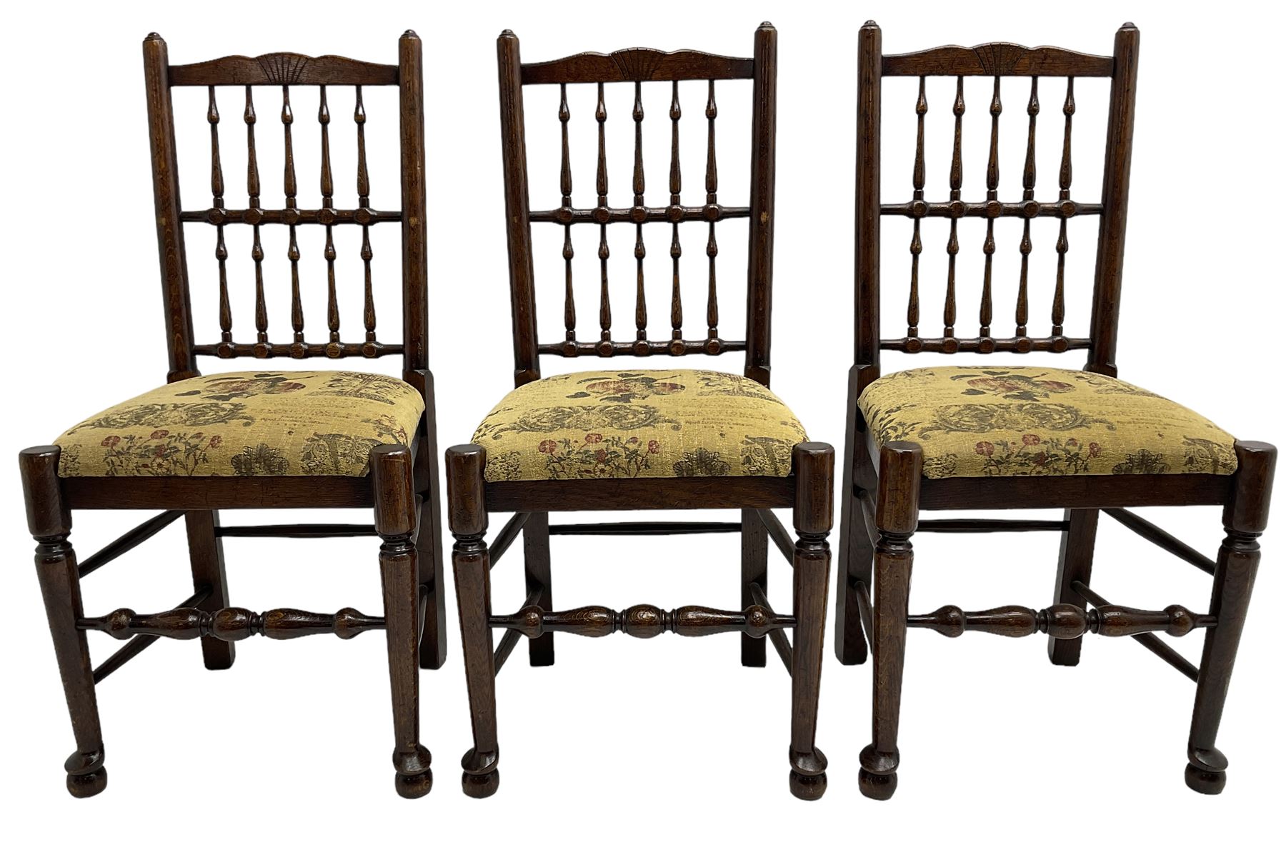 Set of six (4+2) 20th century oak spindle back dining chairs, with upholstered drop-on seat cushions, turned supports joined by turned stretchers