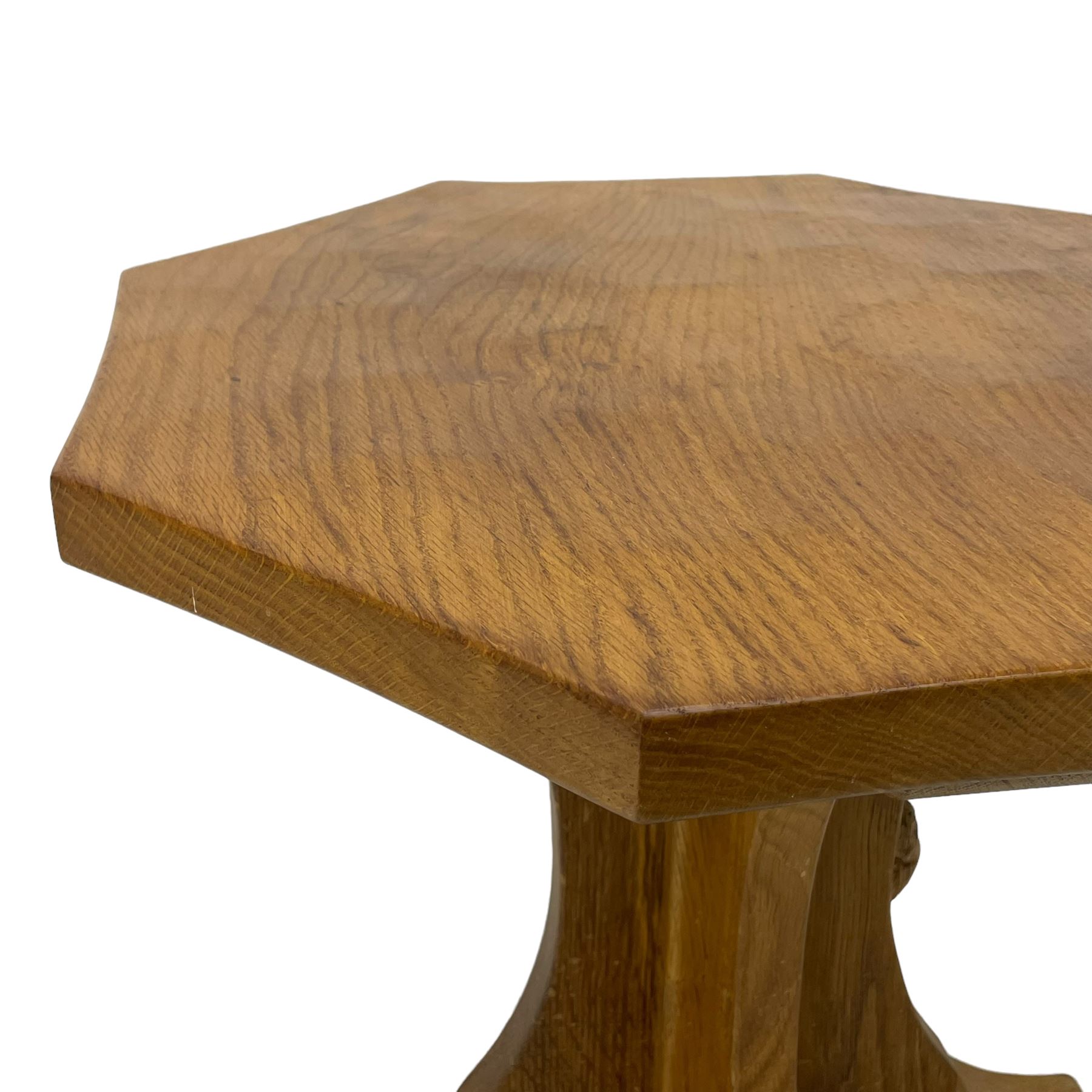 Mouseman - oak occasional table, octagonal adzed top, cruciform pedestal on sledge feet, carved with mouse signature, by the workshop of Robert Thompson, Kilburn 