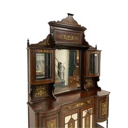 Late Victorian inlaid rosewood mirror back sideboard, shaped cresting rail decorated with scrolling foliate ivorine inlays, over rectangular bevelled mirror, flanked by bow-front glazed cupboards over inlaid 'green man' motifs, the base fitted with single drawer and cylindrical cupboards flanking a mirror panelled cupboard, on square tapering supports