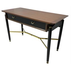 E. Gomme for G-Plan - ‘Librenza’ afrormosia and black finish console, fitted with two drawers, on turned supports united by brass stretchers