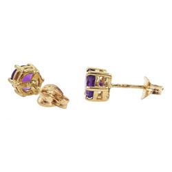 Two pairs of 9ct gold amethyst stud earrings, both hallmarked