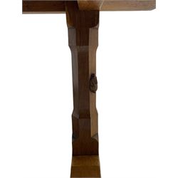 Rabbitman - oak dining table, rectangular adzed top, twin octagonal pillar supports on sledge feet, united by floor stretcher, carved with rabbit signature, by Peter Heap of Wetwang 