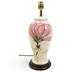 Moorcroft baluster form table lamp decorated in the Magnolia pattern, on cream ground, H31cm excluding fitting