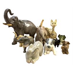 Group of ceramic and resin animal figures, mostly elephants, to include USSR model of a seated Terrier puppy, and a USSR model of a baby elephant, in one box