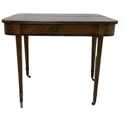 19th century mahogany tea table, fold-over top with reeded edge over inlaid frieze, on double gate-leg action square tapering supports, with brass castors