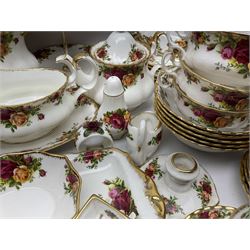 Royal Albert Old Country Roses pattern coffee service for six, comprising coffee pot, milk jug, cups and saucers, cake plate, together with miniature teapot, six teacups and saucers, six dinner plates, six side plates etc 