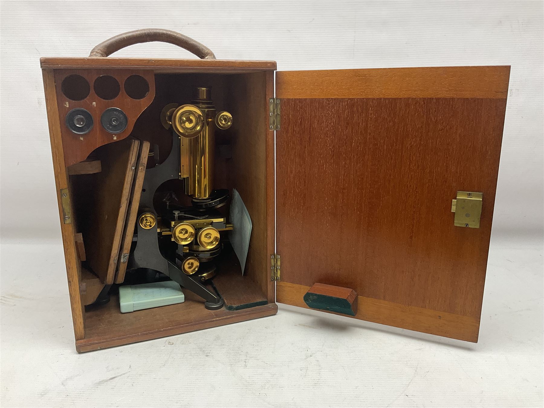 W. Watson & Sons Ltd lacquered brass compound microscope circa 1910, the back foot signed W. Watson & Sons Ltd, 313 High Holborn London and numbered 8193, together with a boxed collection of glass microscope biological sample slides