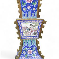 20th century Chinese brass and enamel Zun form vase, decorated with figures and birds in panels, lappet borders and trailing foliage against a blue ground, on pierced rectangular stand, H38cm