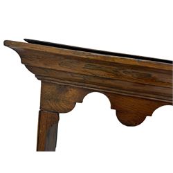 Two Victorian pine plate racks, one with scalloped cornice with central diamond shape and scroll ends over three shelves, the other with scalloped cornice, three shelves and fifteen hooks (2)