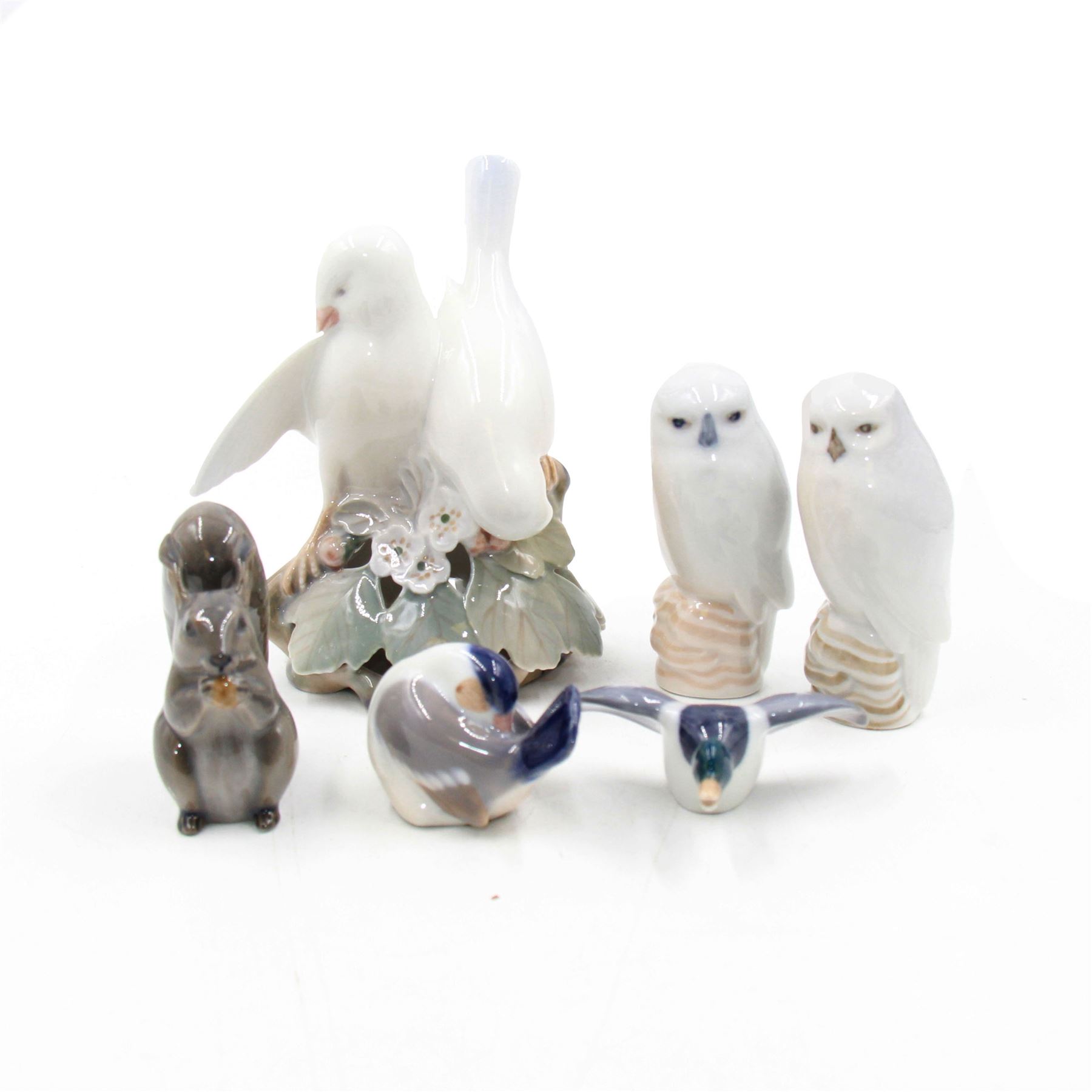 Royal Copenhagen figures, comprising model of a pair of Love Birds no402, pair of Snowy Owls no1741, Grey Squirrel no982, Duck no2215, and Finch no1041, (6)