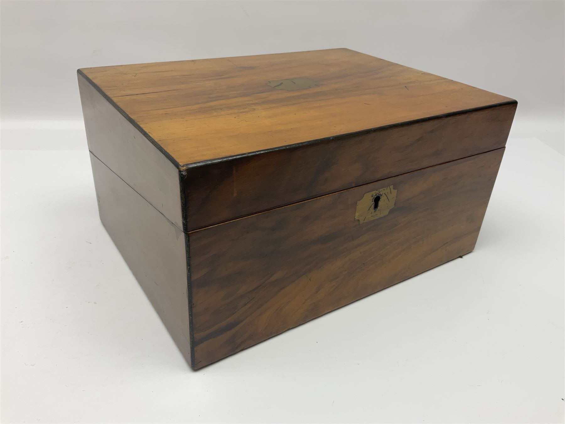 19th century walnut writing slope, the hinged lid with inlaid cartouche opening to reveal black gilt tooled leather slope and pen storage, H15cm, L30cm