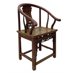 Late 19th century Chinese Qing dynasty horse shoe armchair, in elm, hung mu and Chinese softwood, horse shoe shaped upper rail carved with scroll terminals, shape back carved with solitary figure in robes, rectangular panelled seat in moulded frame, decorated with fretwork panels, on square supports united by stretchers 