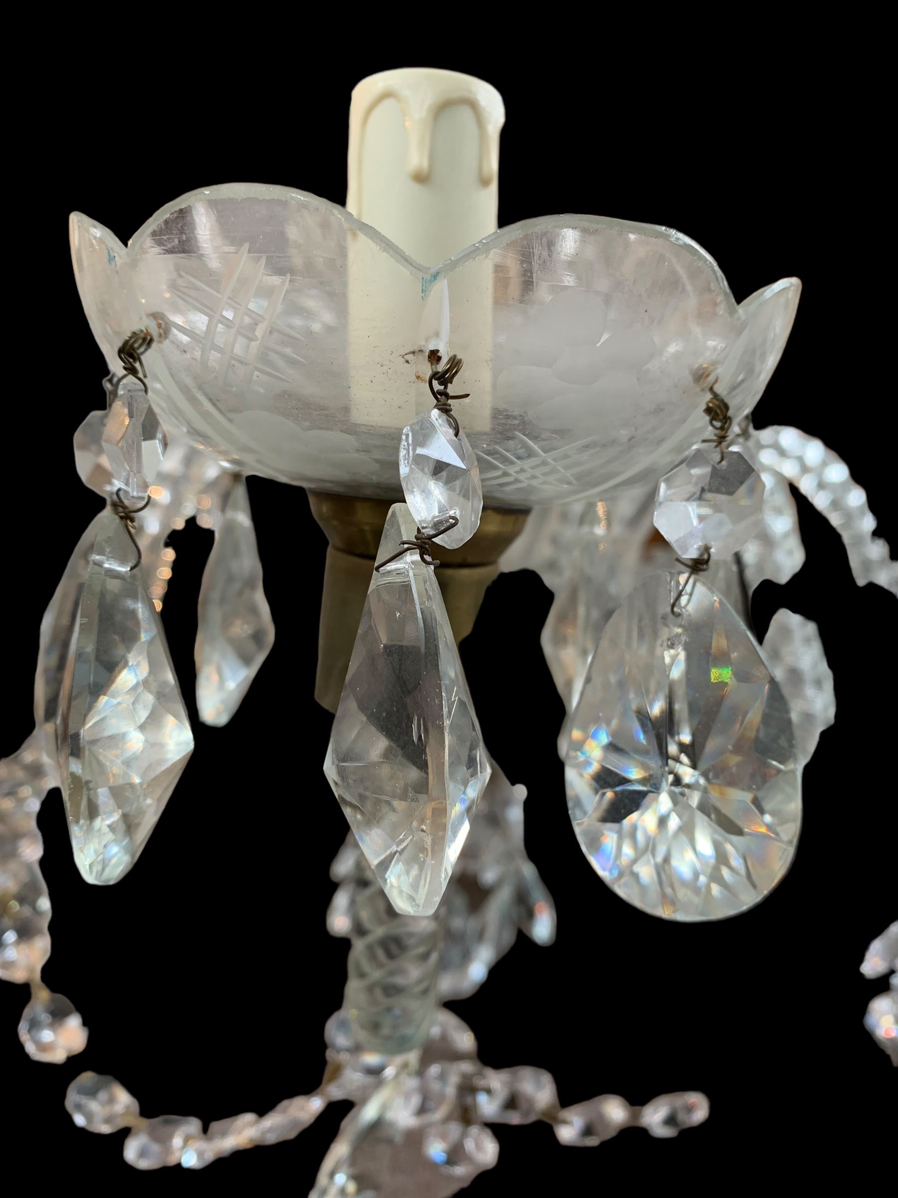 Italian style eight branch glass chandelier, with baluster stem, eight barley twist scroll arms interspersed by seven clear blown glass leaves, petal edged drip pans and hung with faceted glass bead swags and drops, H94cm x W85cm approx.