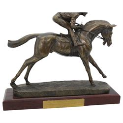 'Go Racing in Yorkshire Special Achievement Award, Guy Reed' - Bronze resin figure of a racehorse with jockey up on wooden plinth 30cm x 35cm and another 'Winning Owner Cadbury Cup July 2008 York Racecourse' on wooden base 30cm x 33cm (2)