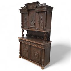 19th century Belgian buffet side cabinet, carved inn scene with figures, fitted with three cupboards, two drawers and two base cupboards