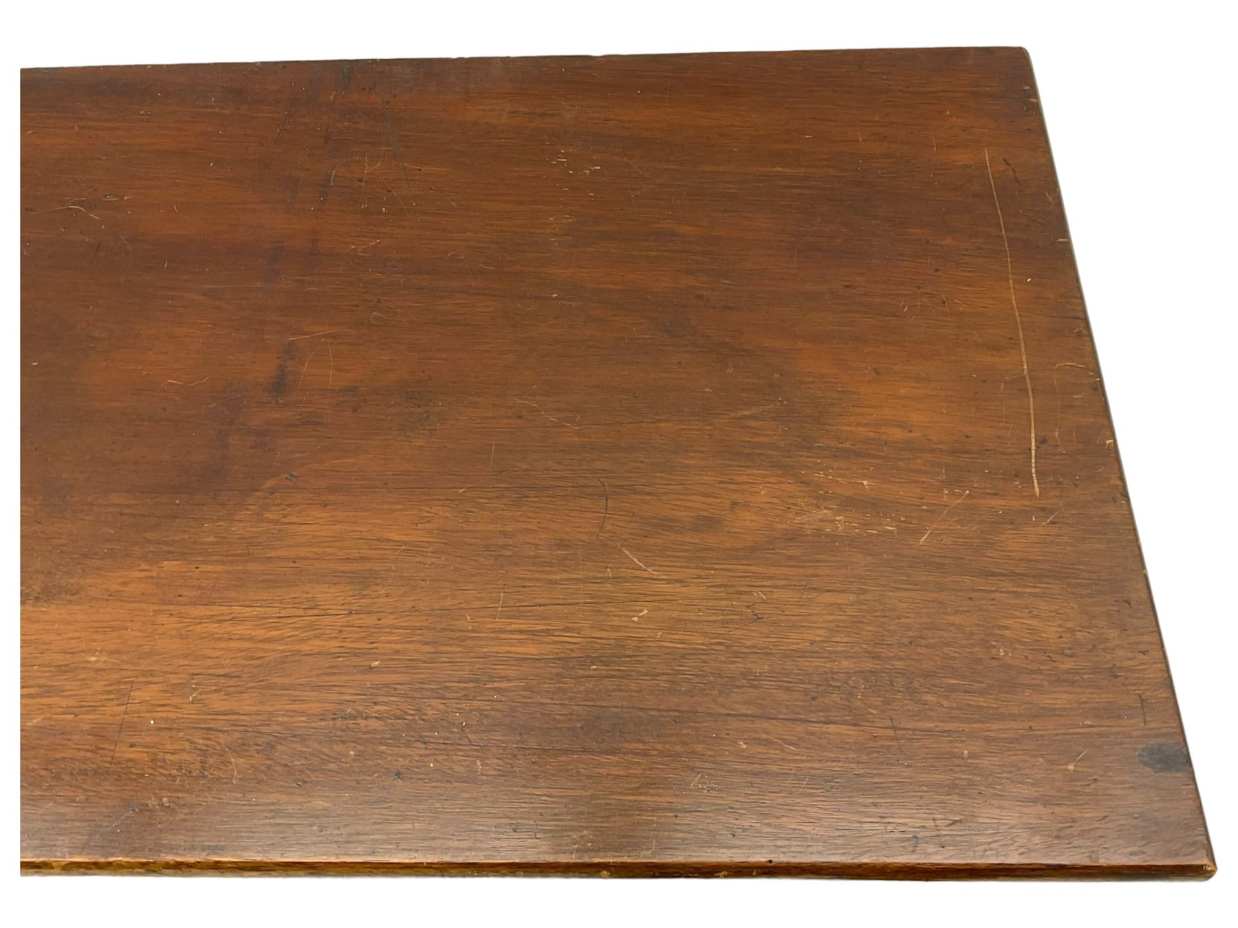 Early 20th century mahogany bookcase, rectangular top over two glazed doors, fitted with four adjustable shelves, on turned bun feet 