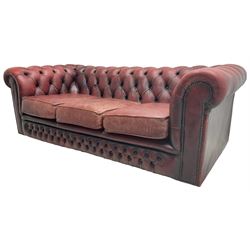 Chesterfield three-seat sofa upholstered in red buttoned leather