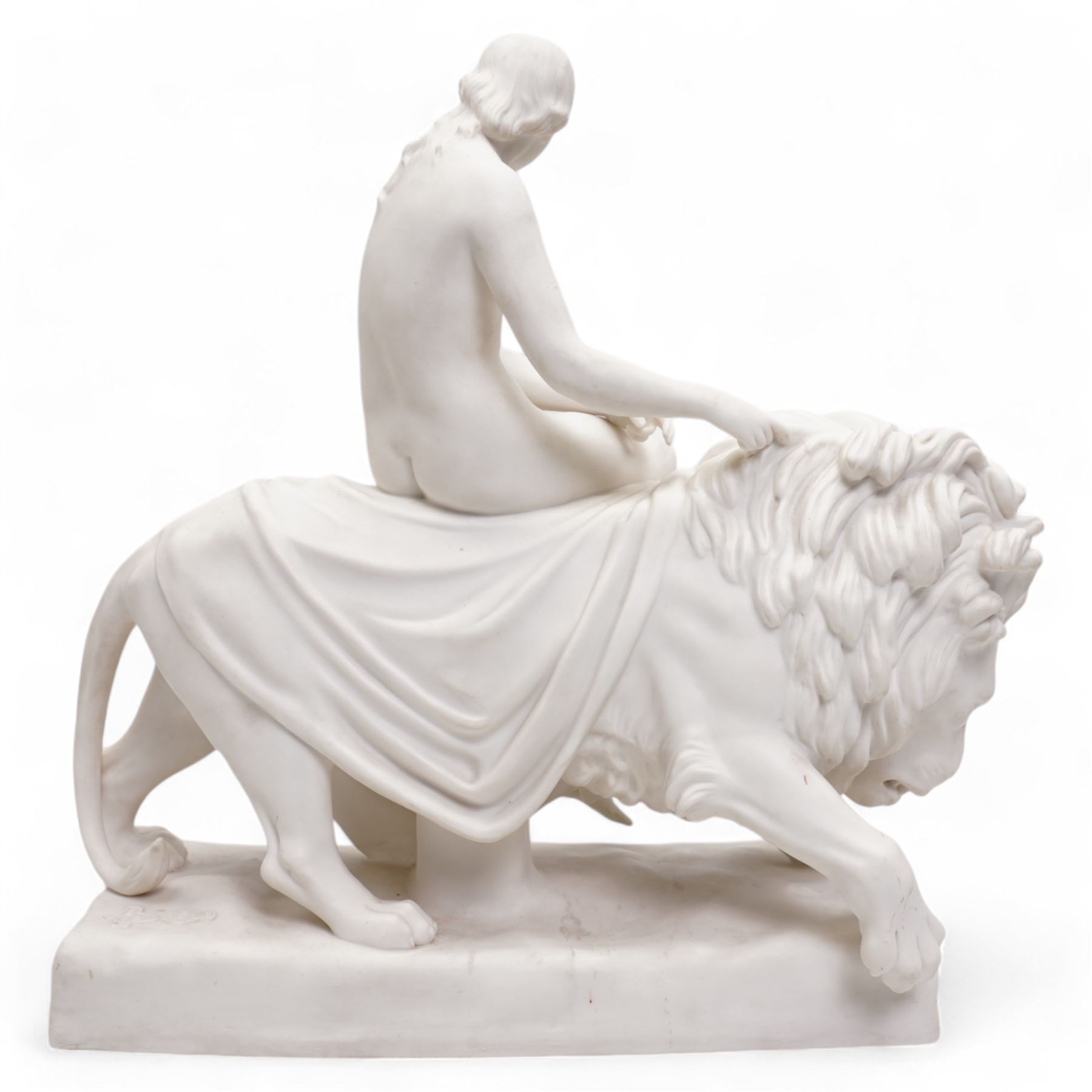 Victorian Minton Parian ware group 'Una and the Lion', designed by John Bell (1812-1895), the nude maiden seated side-saddle astride the male lion, with her fingers holding onto its mane, impressed marks to the rectangular base, L40cm x H37cm