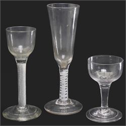 18th century cordial glass with air twist stem, a flute with cotton twist stem and another...