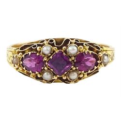 Victorian 15ct gold three stone vari-cut garnet and pearl ring, the shank with engraved fa...