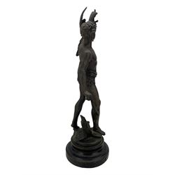 19th century French spelter figure 'Chasseur D'Aigles' on wooden base H48cm and a beaten copper circular tray inscribed with initials D61cm