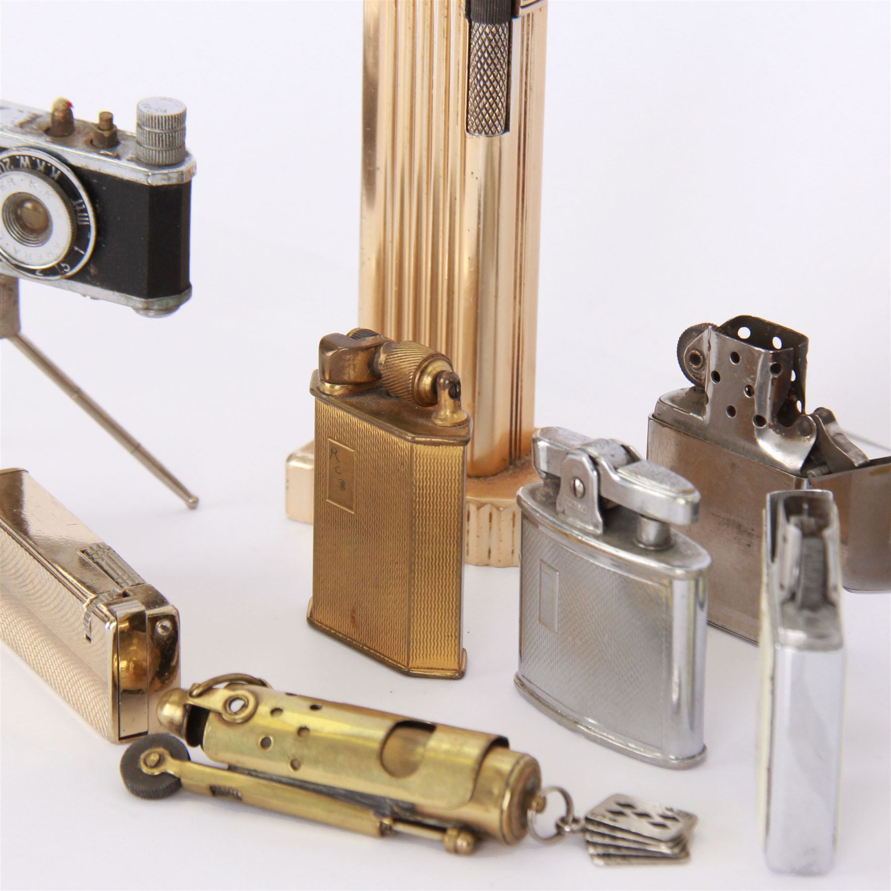 Novelty KKW camera lighter, together with a collection of other lighters, including McMurdo lighter, Benlow Golmet table lighter, Ronson examples, etc