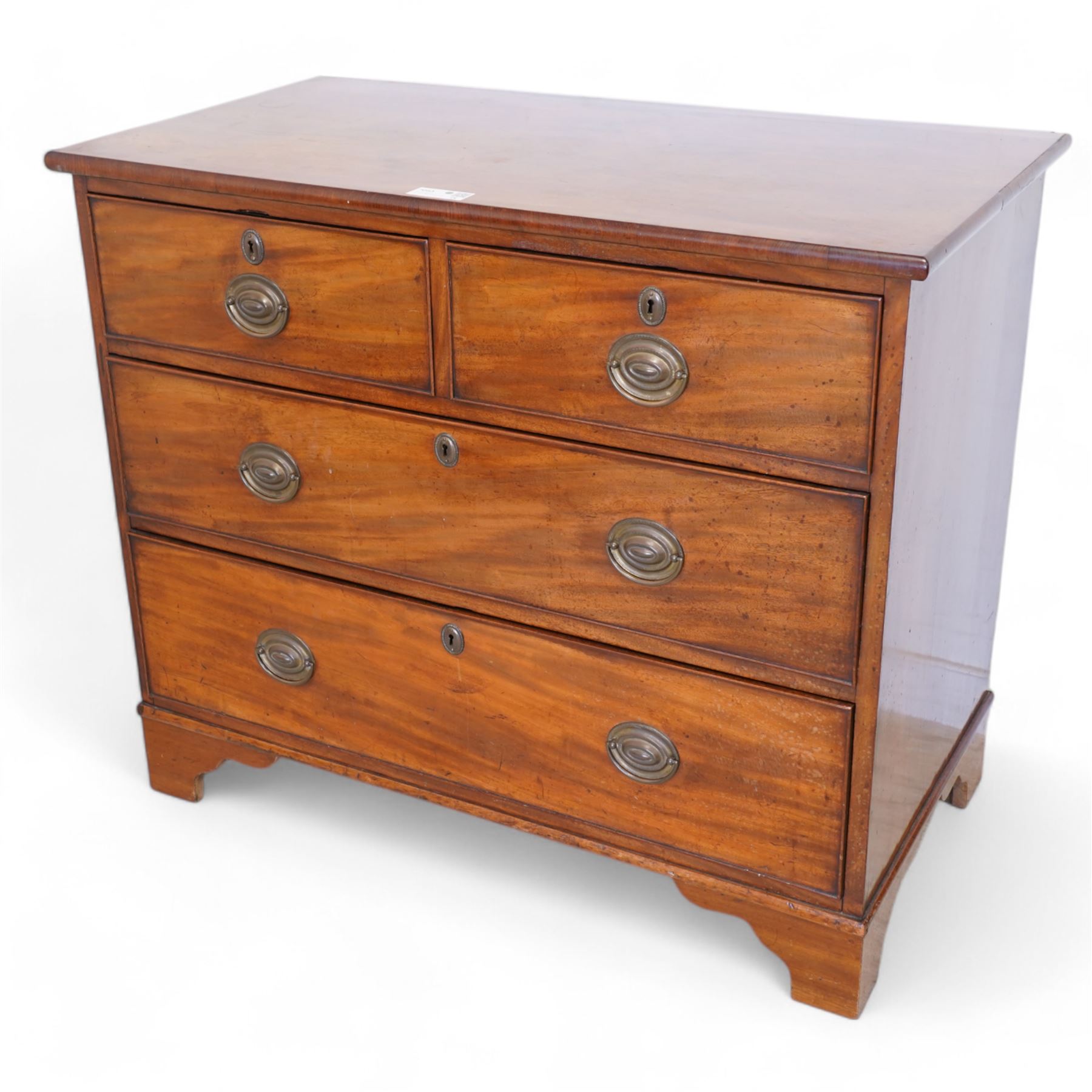 George III mahogany chest, rectangular top over two short and two long cock-beaded drawers, on bracket feet