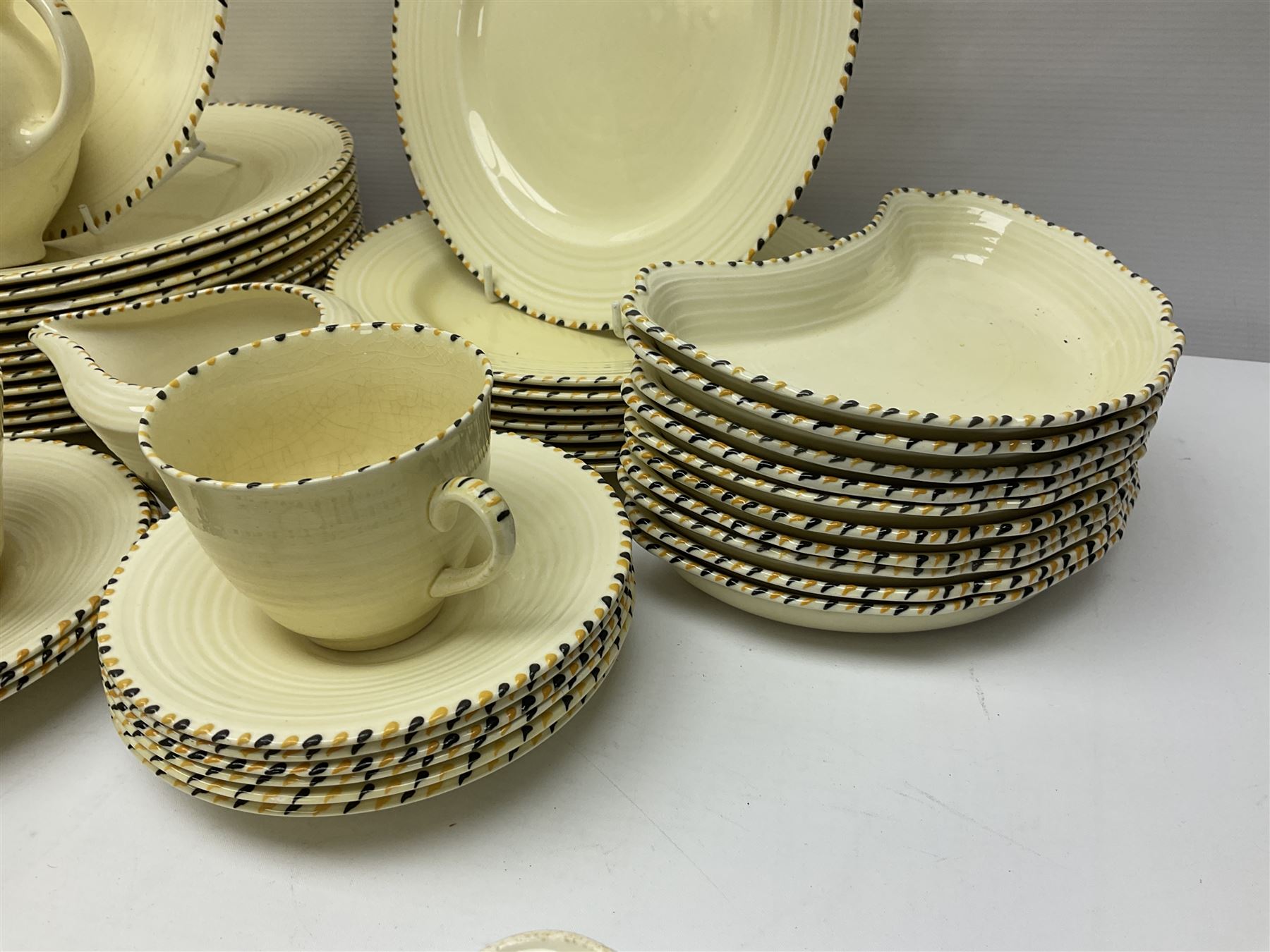 Art Deco Crown Ducal tea and dinner wares, reg no. 784158, comprising dinner plates, teacups, saucers, coffee cups, crescent shaped side plates, bowls, eggcups, etc, (93)