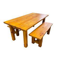 Pine dining table, rectangular plank top on square supports (181cm x 91cm, H80cm); together with two benches (133cmx 41cm, H47cm)