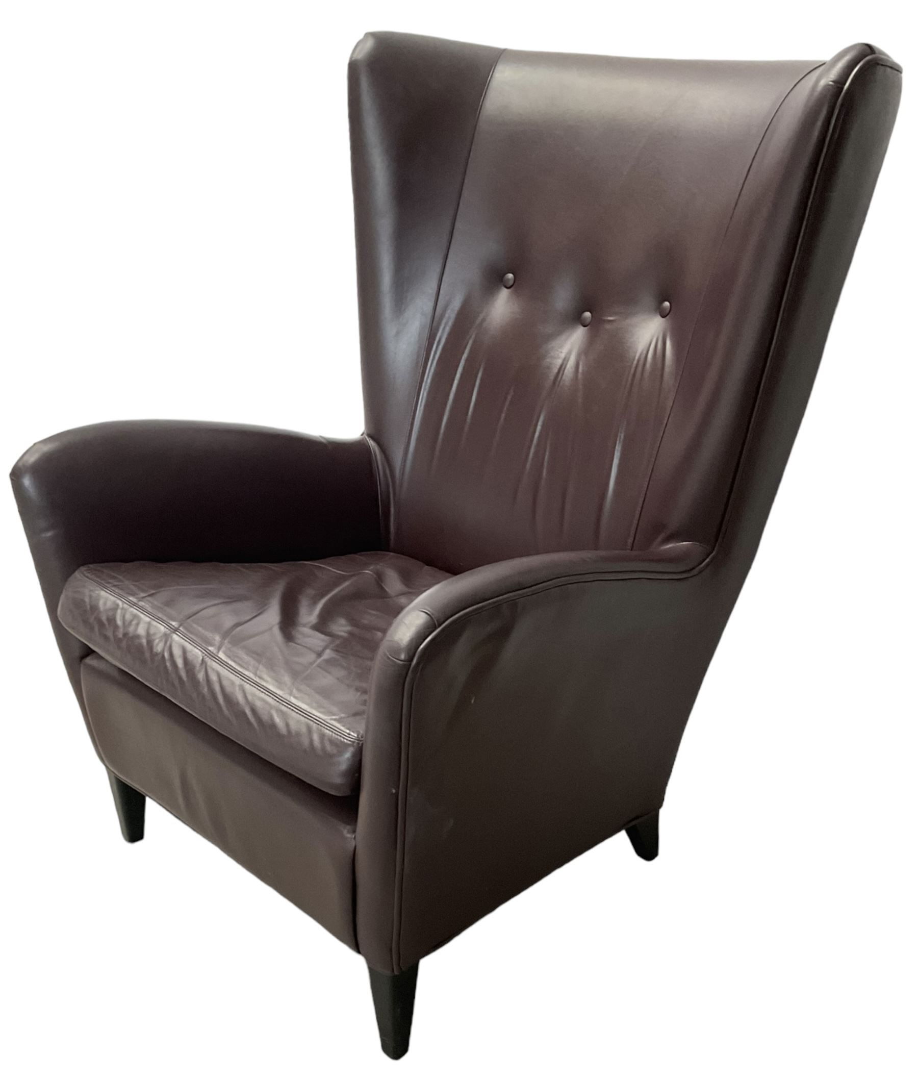 Wing back armchair upholstered in cocoa brown leather