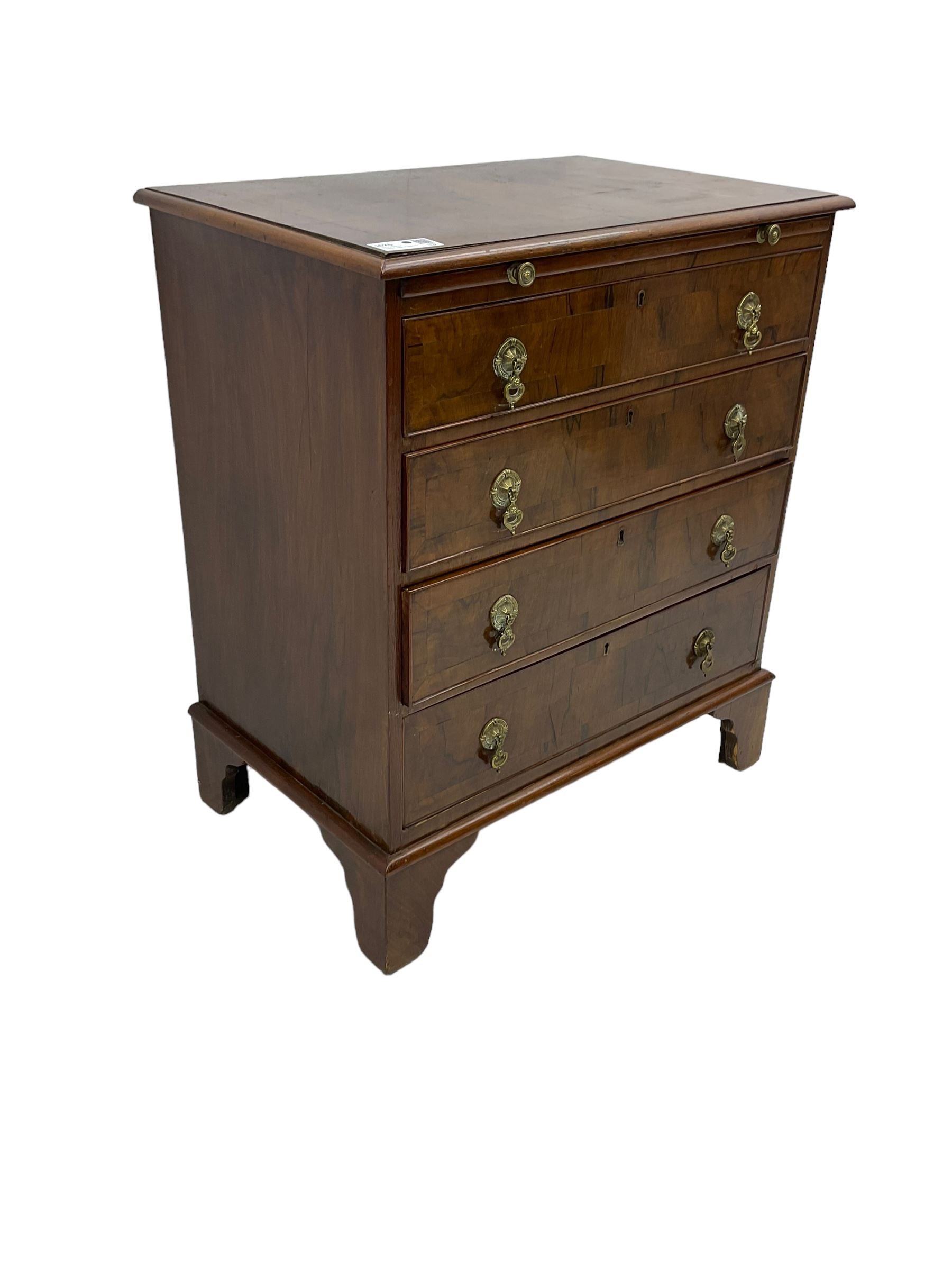 Georgian design walnut chest, crossbanded rectangular ovolo-moulded top, fitted with slide over four long cock-beaded drawers, on bracket feet