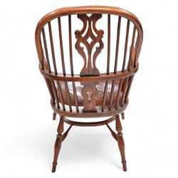 Ash and elm Windsor armchair, double hoop and stick back with shaped and pierced splat, dished saddle seat on turned supports united by crinoline stretcher 