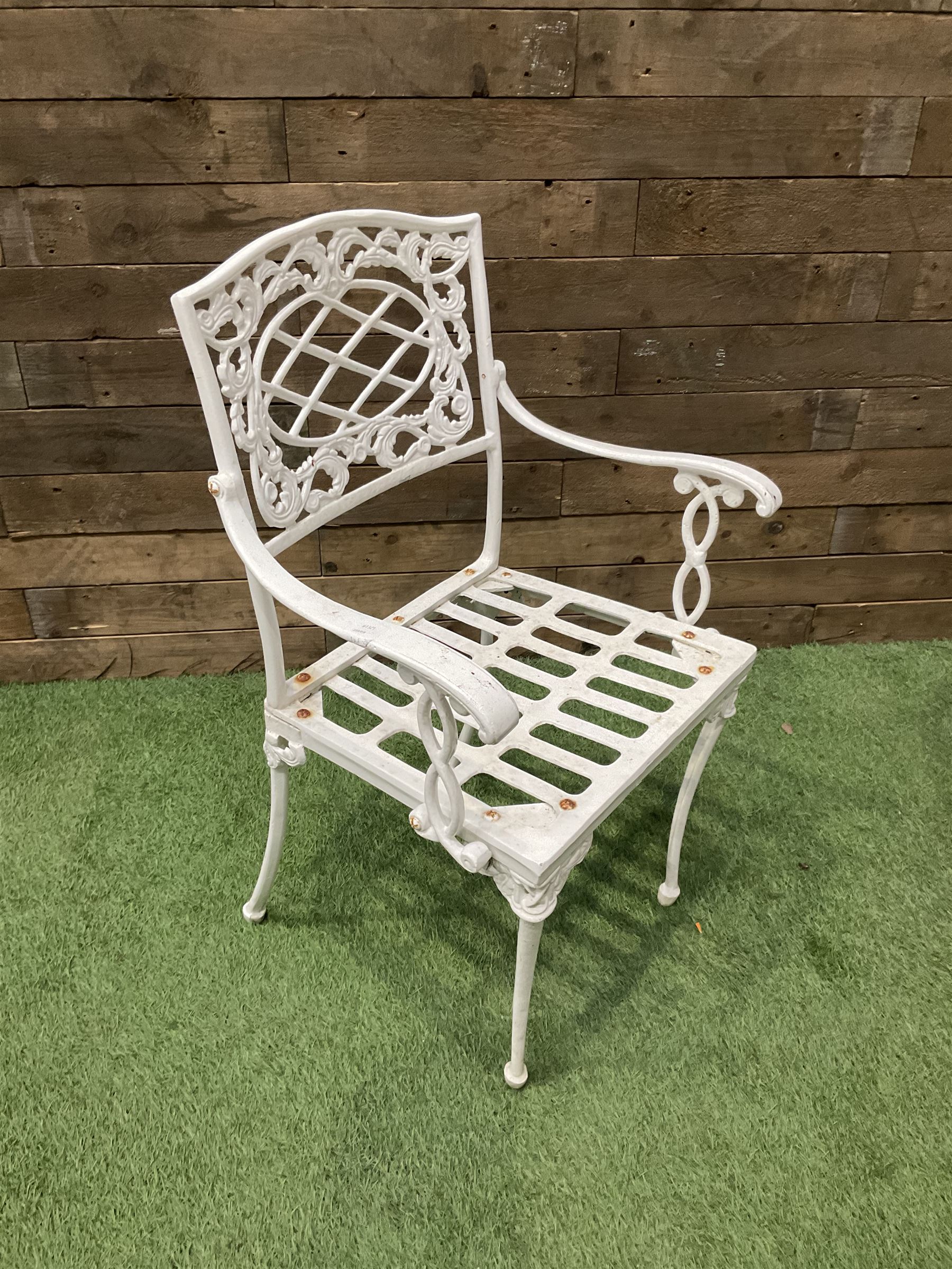 Cast aluminium circular garden table and three chairs - THIS LOT IS TO BE COLLECTED BY APPOINTMENT FROM DUGGLEBY STORAGE, GREAT HILL, EASTFIELD, SCARBOROUGH, YO11 3TX