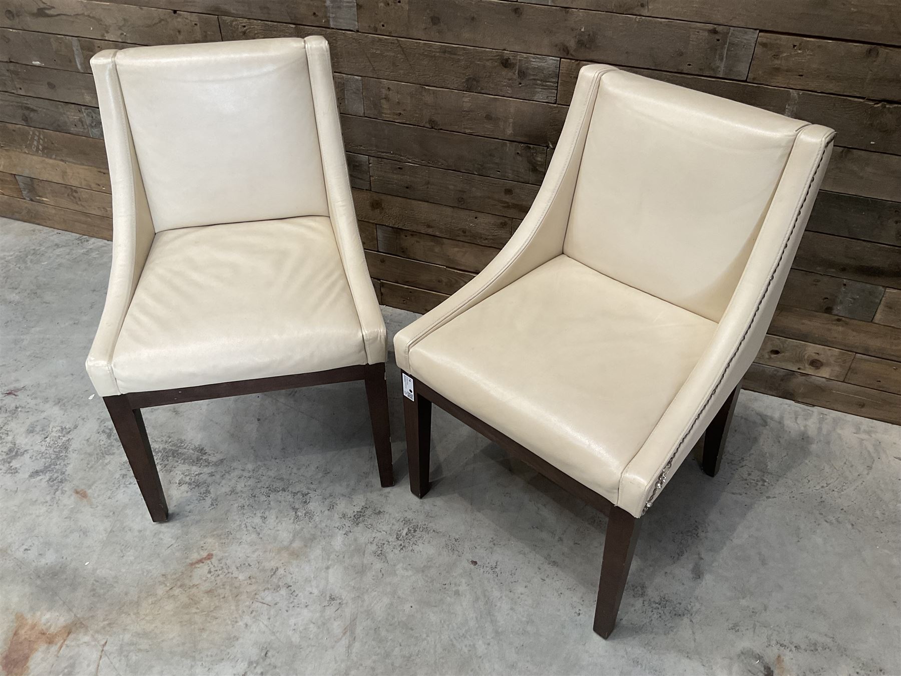 28 x walnut framed dining chairs, upholstered in beige leather