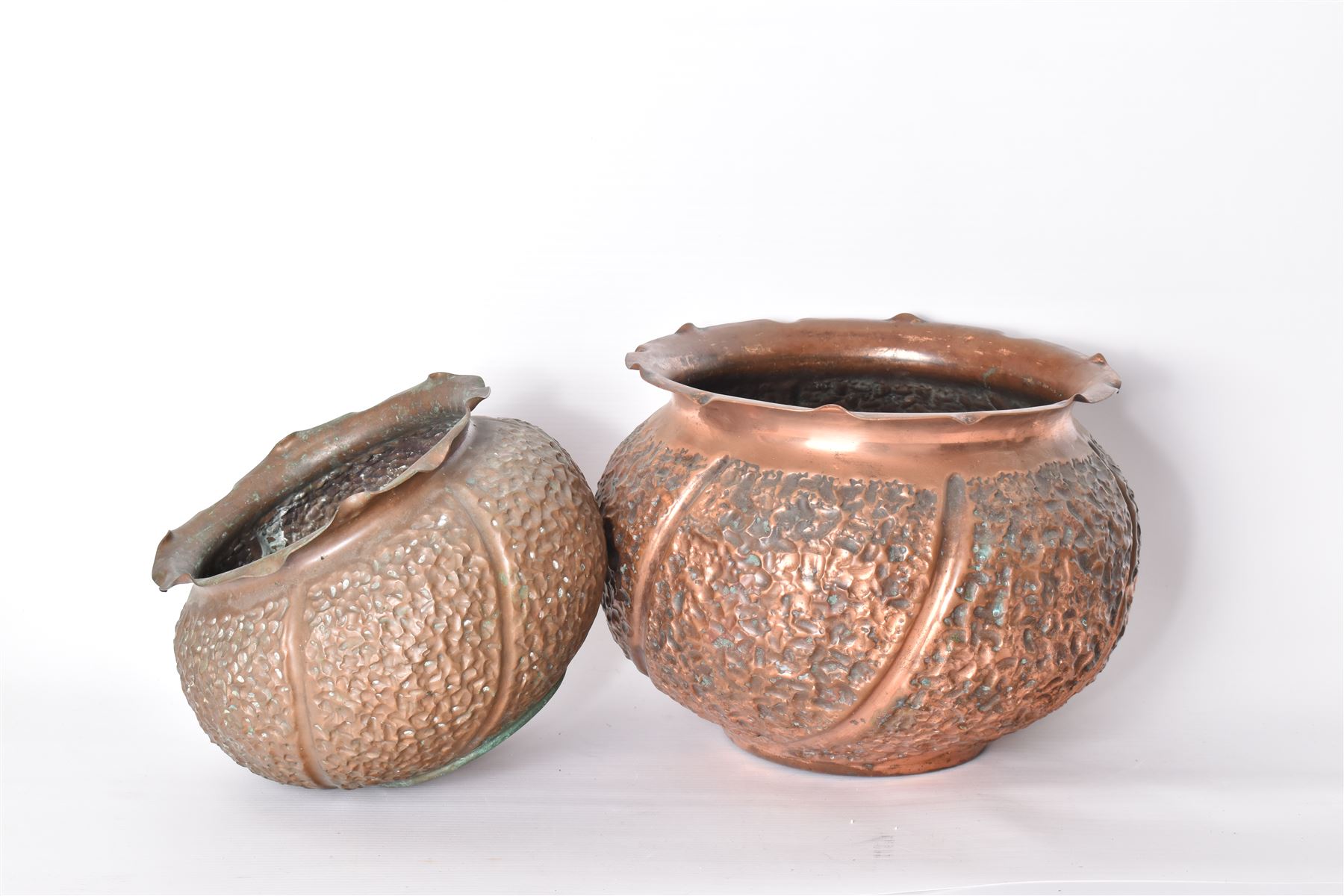 Two Benham and Froud copper planters, with fluted rim, largest H20cm