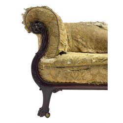 19th century mahogany settee, rolled S-scrolled arms carved with lion masks and acanthus leaf scrolls, the lower moulded rail carved with scrolling design, raised on carved paw feet with recessed brass and ceramic castors 