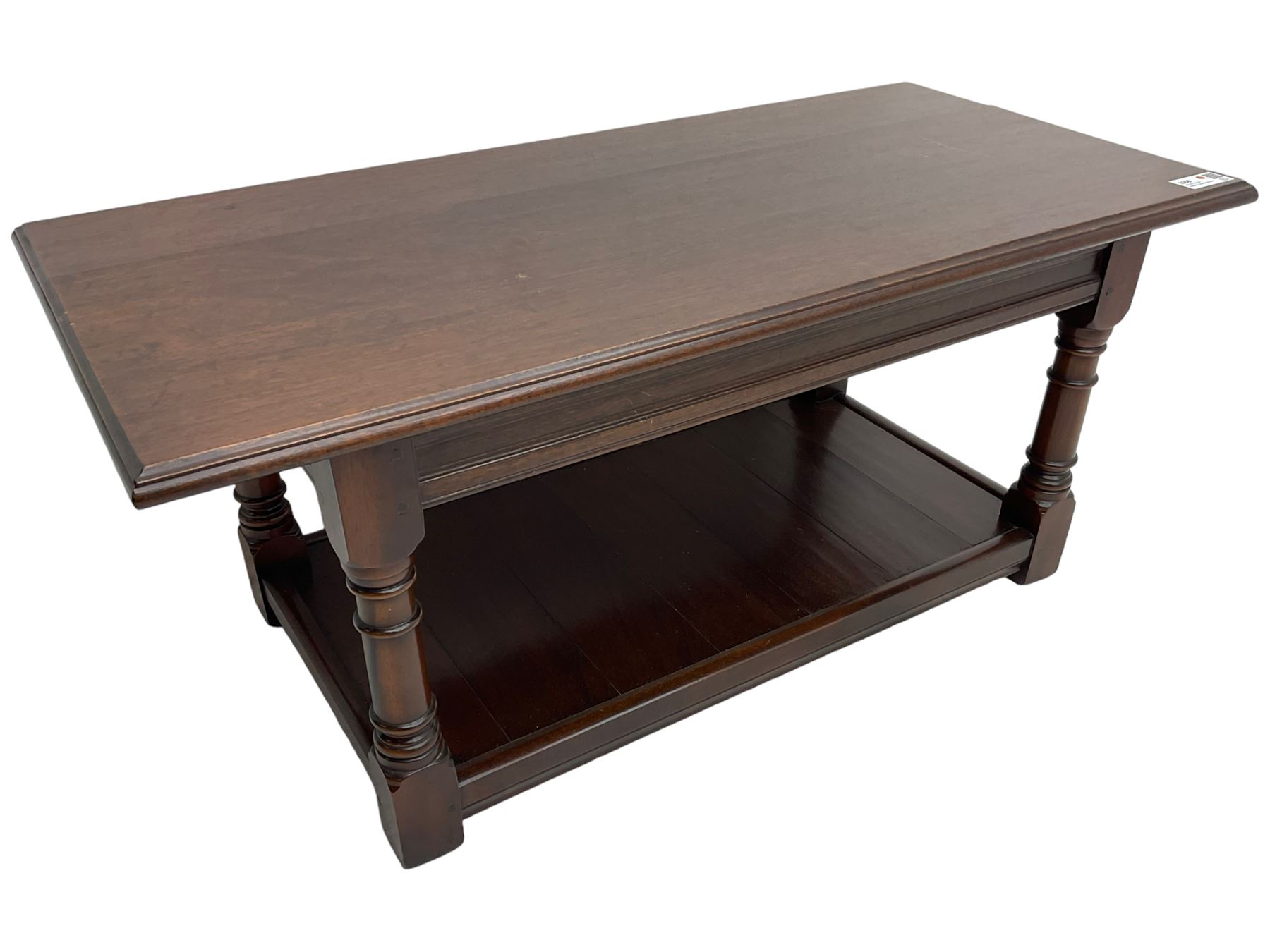 Rectangular mahogany coffee table, moulded rectangular top, turned supports united by undertier 