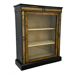 Victorian ebonised and walnut pier cabinet, rectangular top over figured frieze with central star motifs, enclosed by single glazed door, decorated with cast gilt metal mounts and beading, on chamfered plinth base 