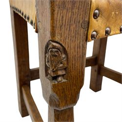 Gnomeman - set of eight (6+2) oak dining chairs, adzed panelled back over tan leather upholstered seat with applied stud band, on square supports united by plain stretchers, each chair carved with gnome signature, by Thomas Whittaker, Littlebeck, Whitby